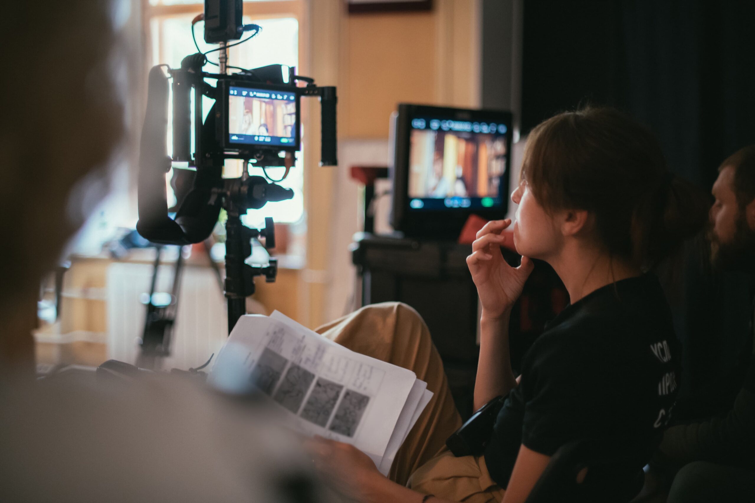 director coaching actor on set using scripted strategic messaging