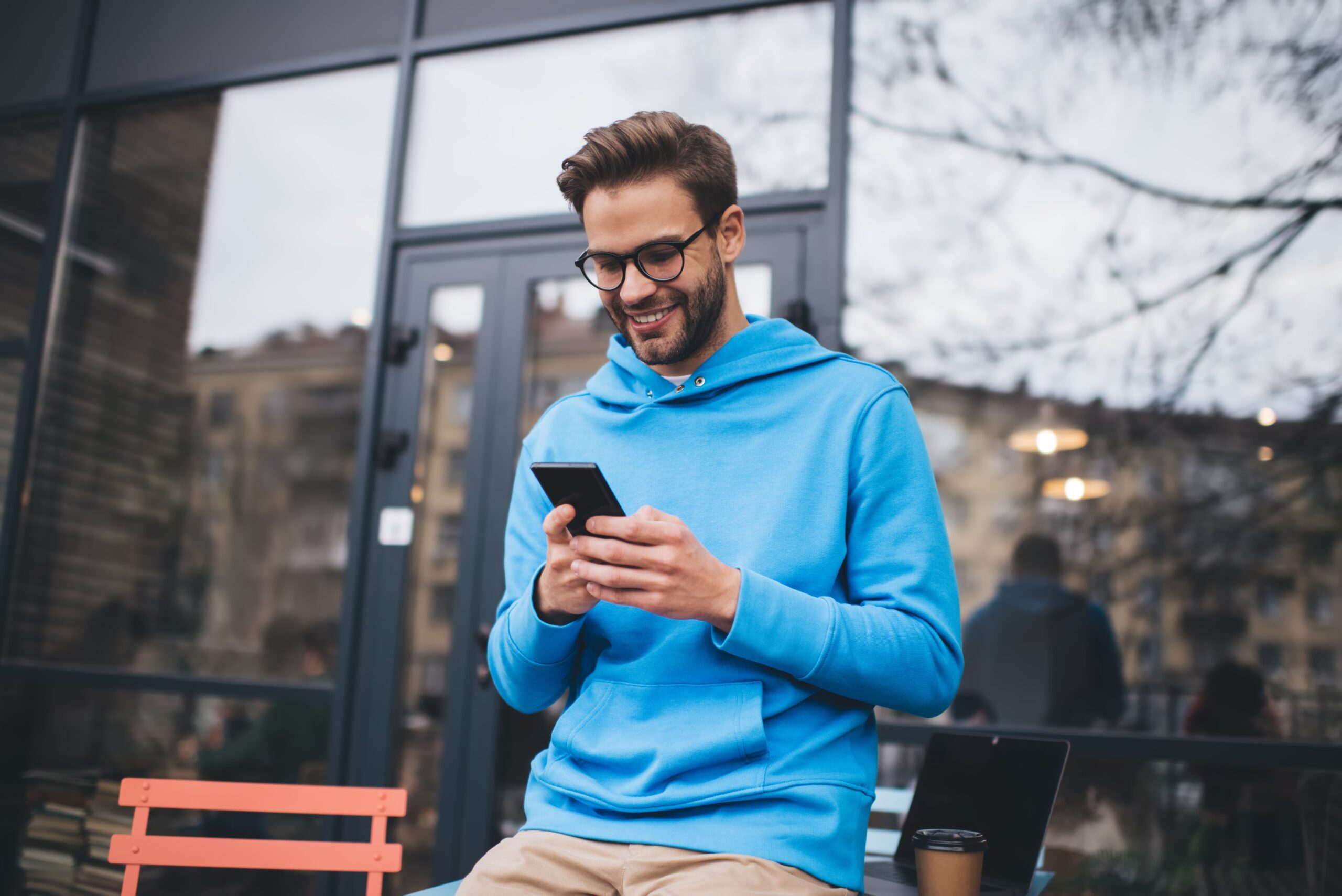 user smiling while engaging with emotional brand experience online