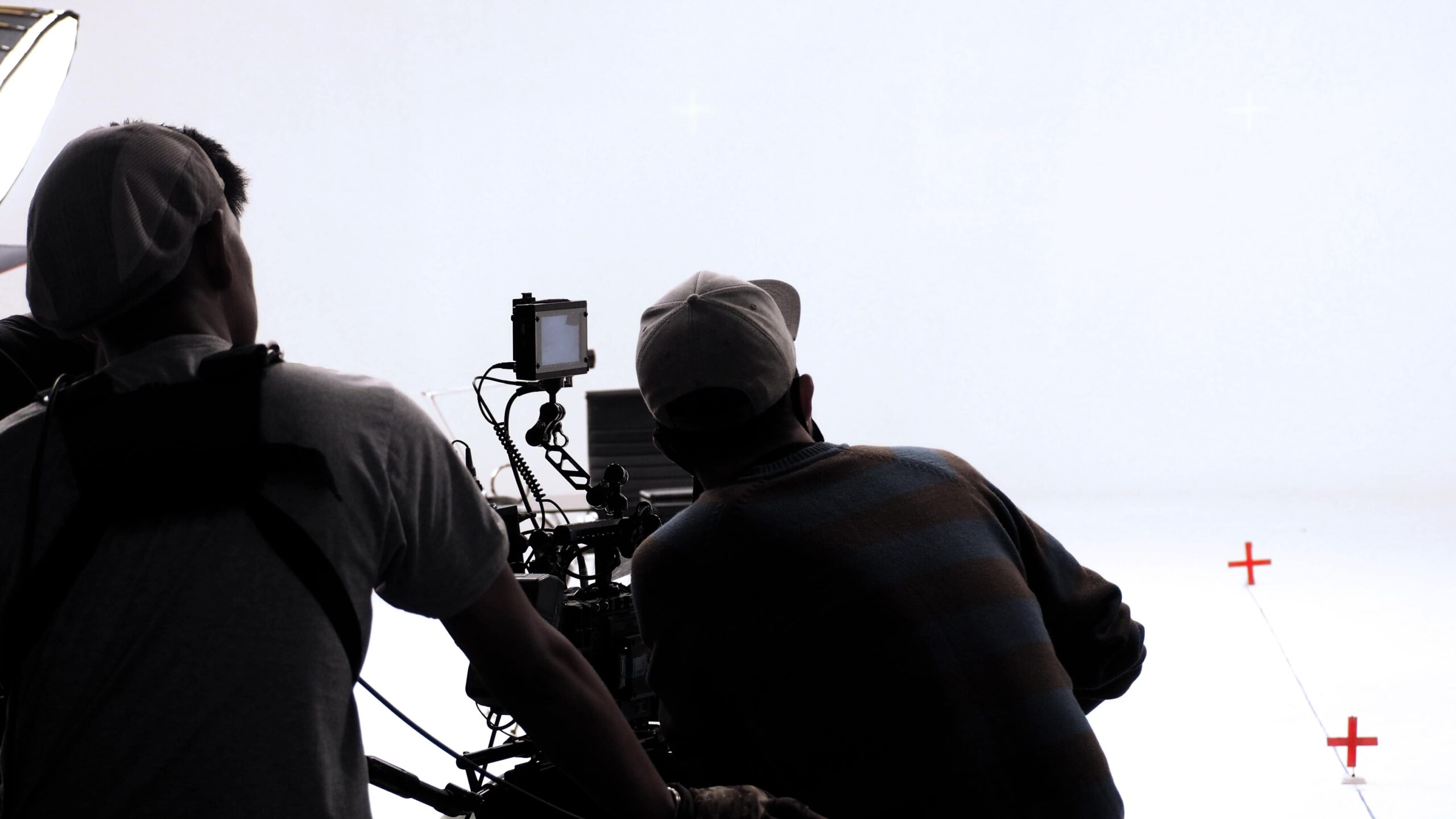 professional video production team filming on set for a brand shoot