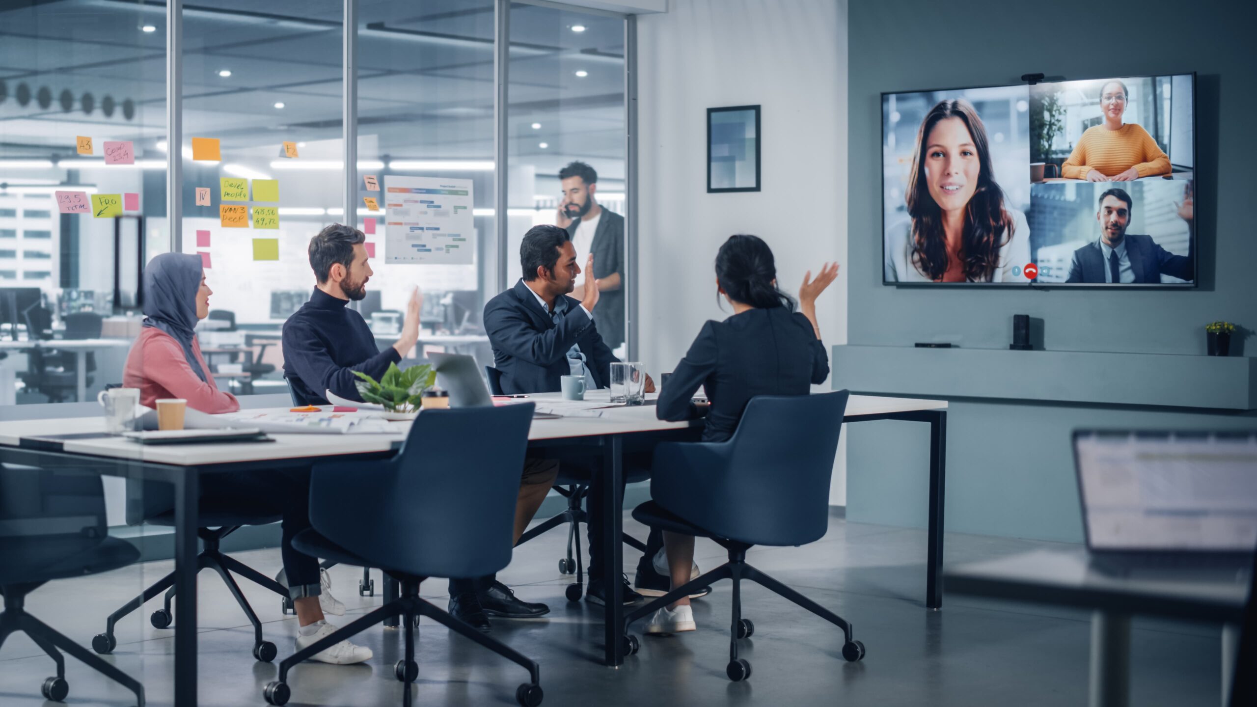 Creative advertising team planning adaptable campaigns in 2025