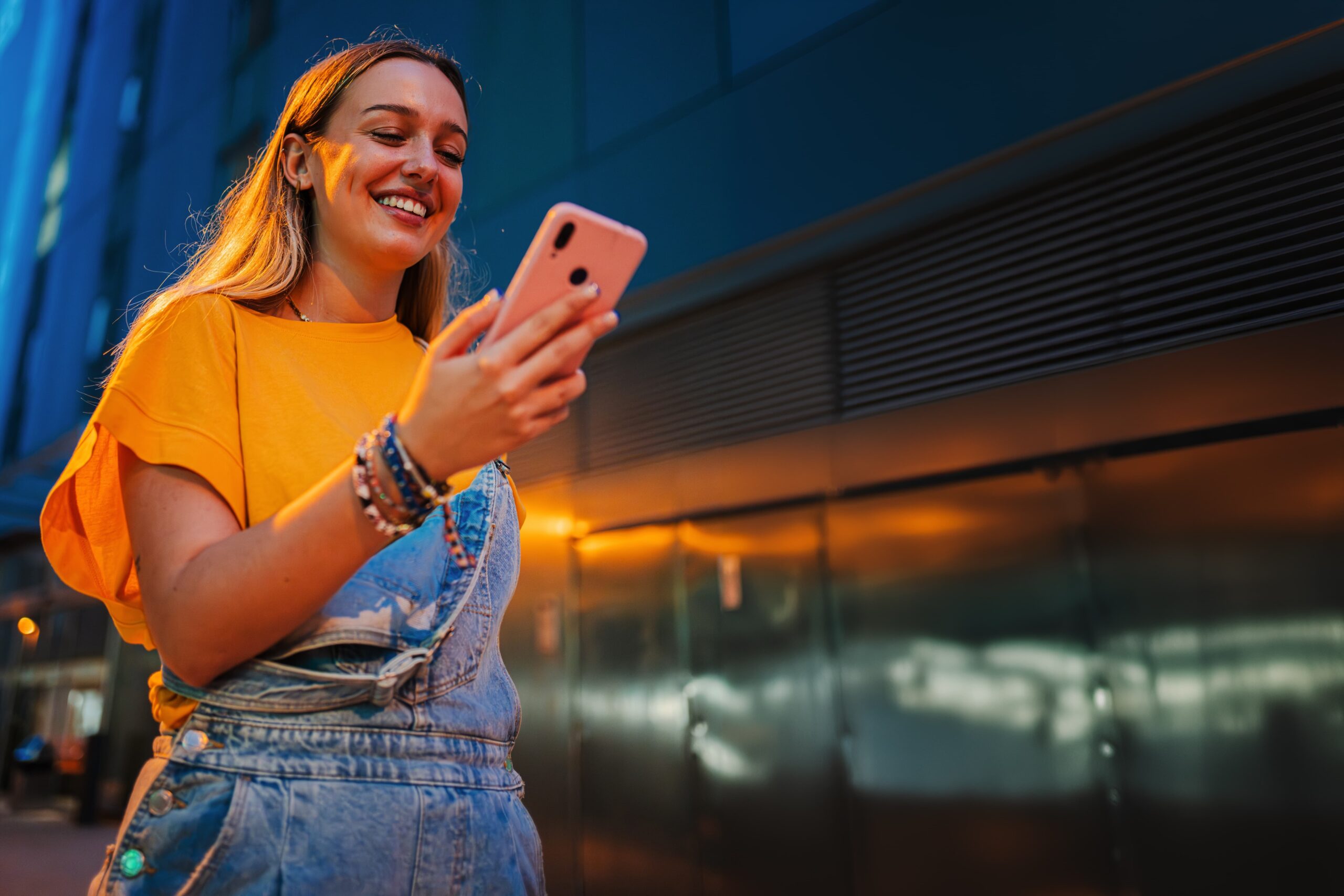 Los Angeles users checking social media on smartphones during evening hours