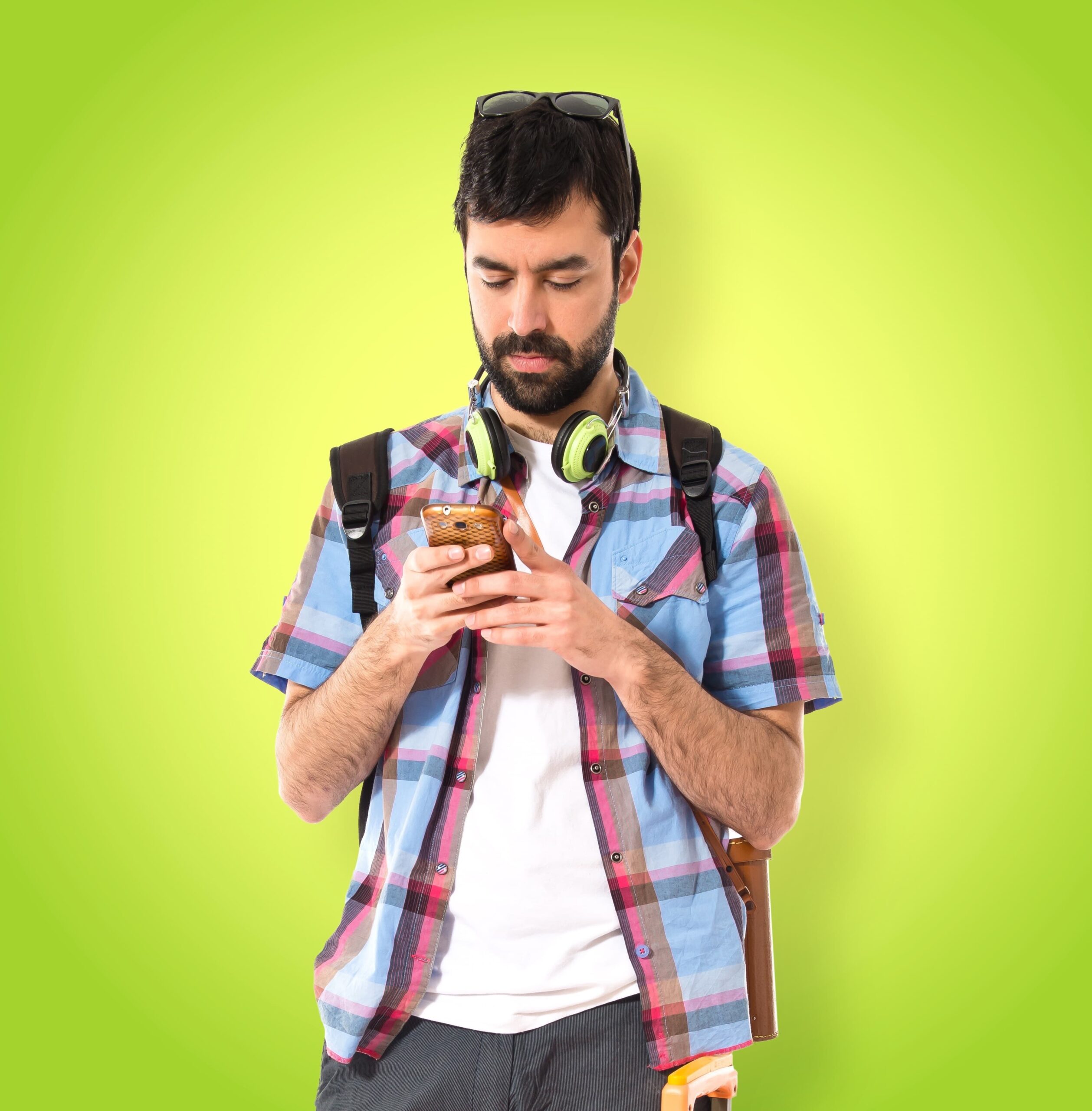 Person focusing on content on a smartphone, showing what captures attention in digital branding