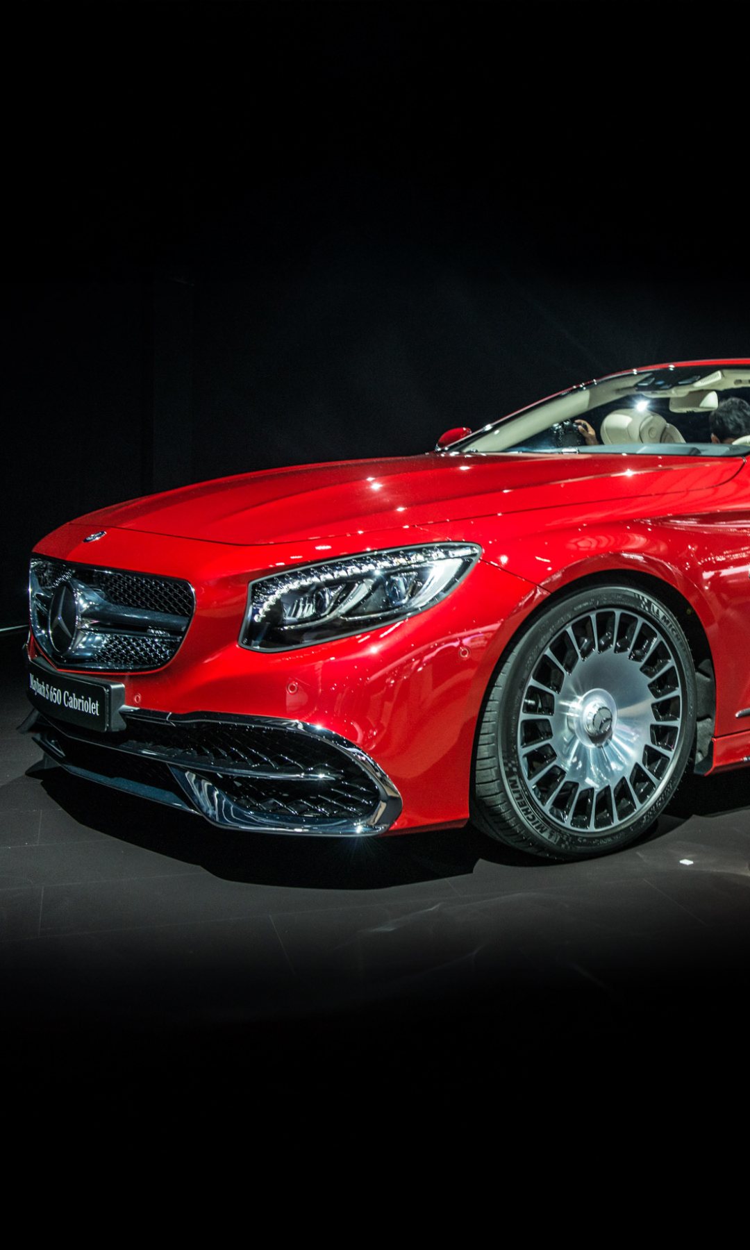 Red Mercedes-Maybach S 650 Cabriolet under show lights